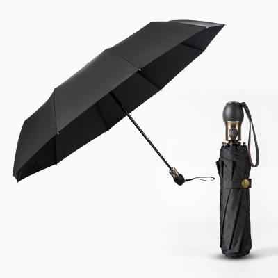 Parapluie Pliant pour Homme et Femme - Ouverture et fermeture automatiques - 10 Baleines en fibre de verre - Grande toile de 115 cm - Parapluie Pliant à Trois Volet - Résistant au vent - Noir