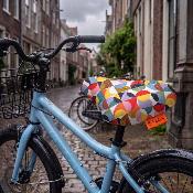 Housse de selle de vélo pour enfants - Cercles géométriques multicolores